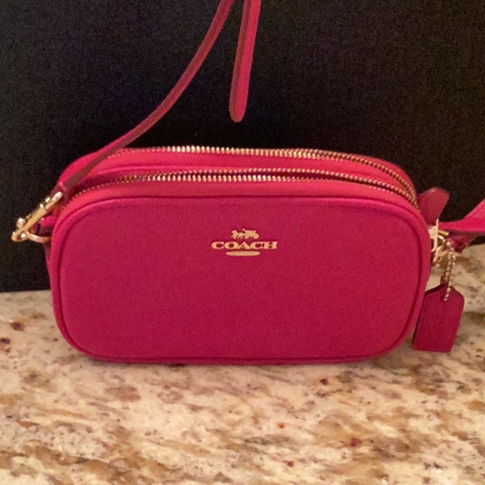 Very cute pink Coach crossbody.